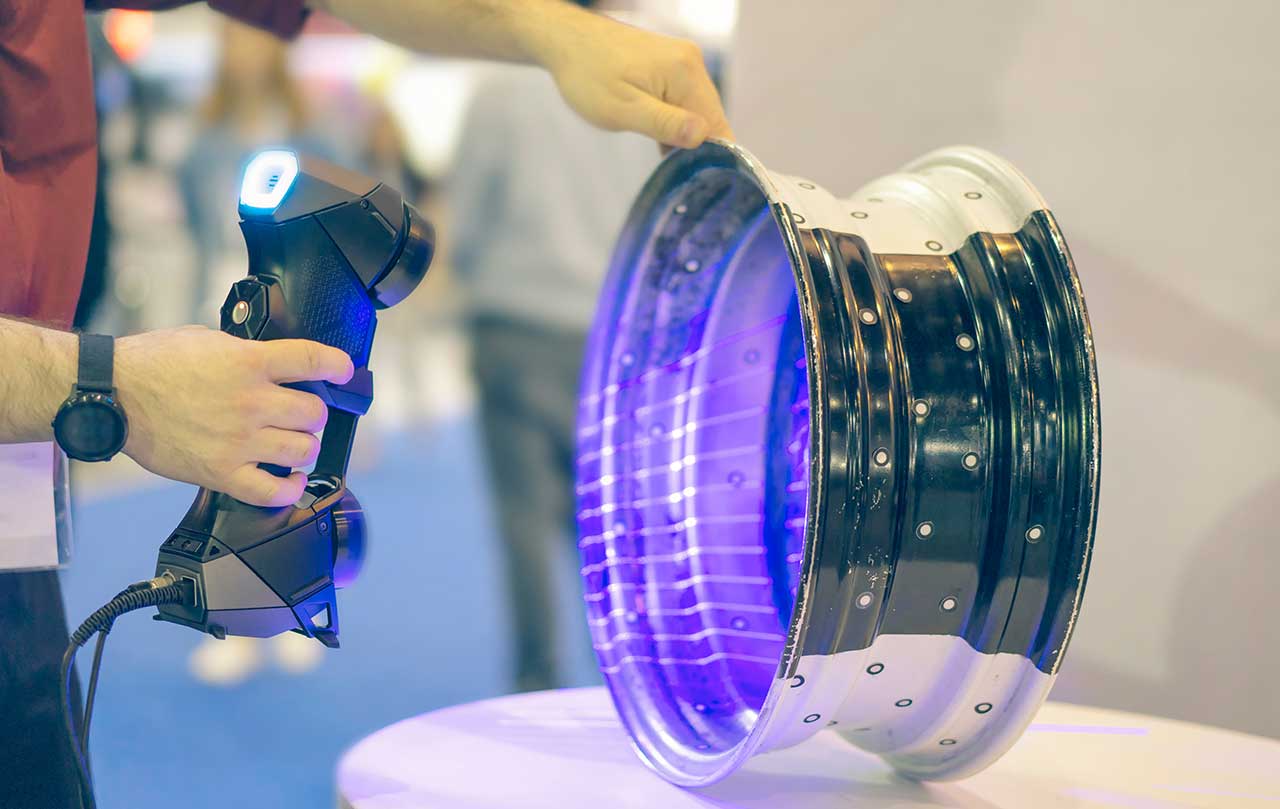 3d scanning car wheel car wheel being 3D scanned