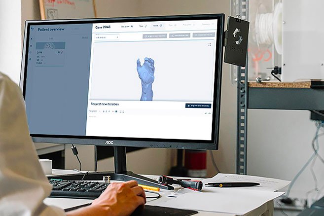 hand 3d data computer screen displaying 3D scan data of a human hand