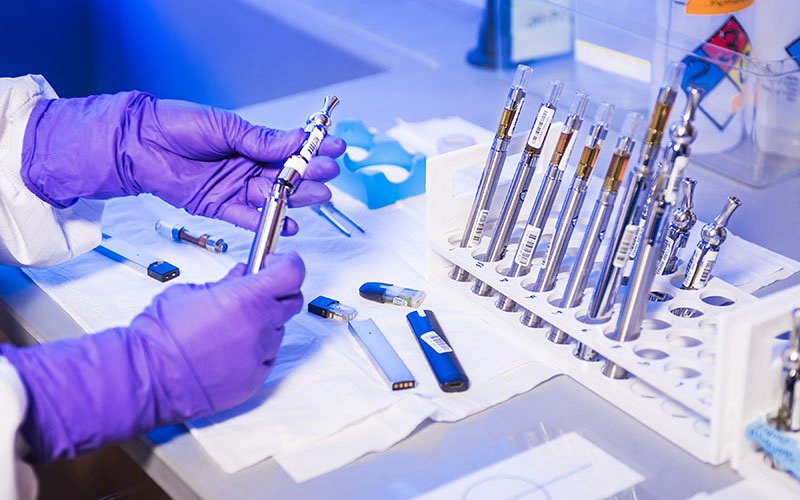 healthcare research measurement A scientist conducting medical research